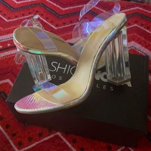 Wrap around Ankle Clear Pumps